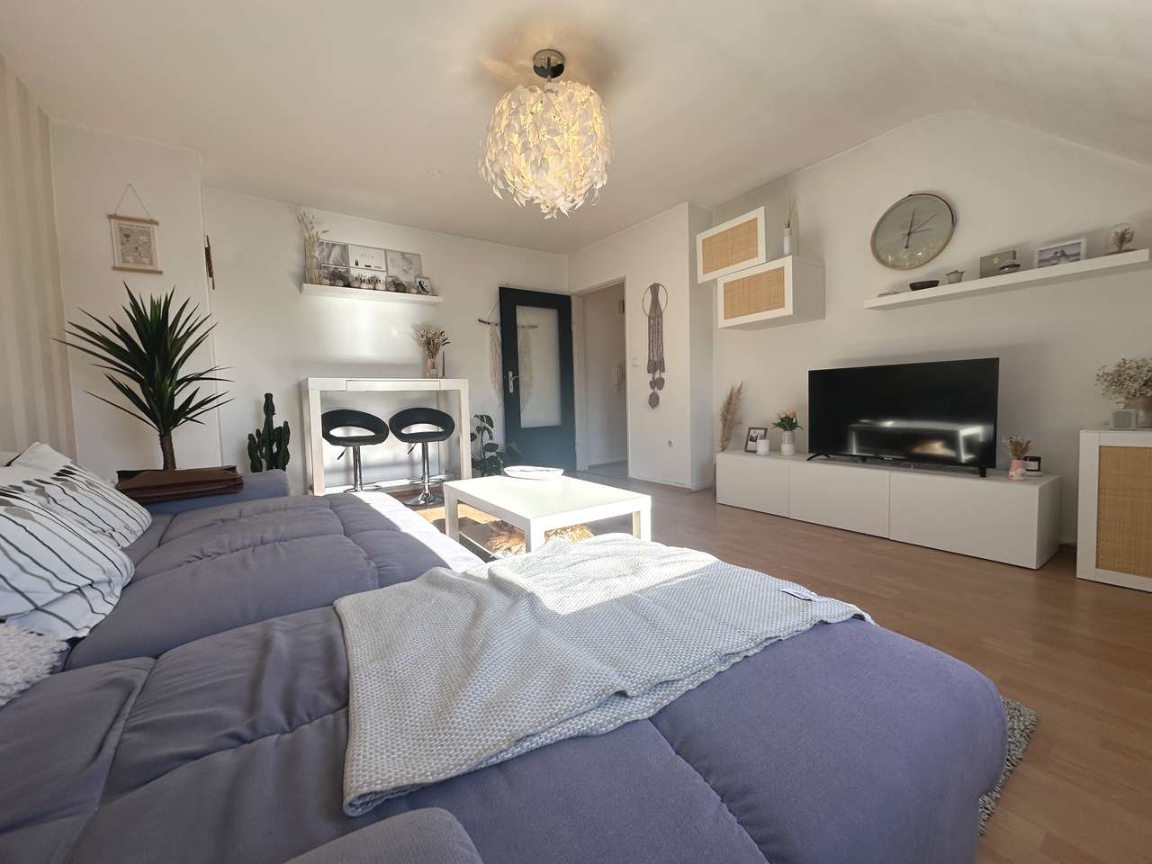 Top-Investment: Vermietete DG-Wohnung mit Garage & flexibler Raumnutzung!