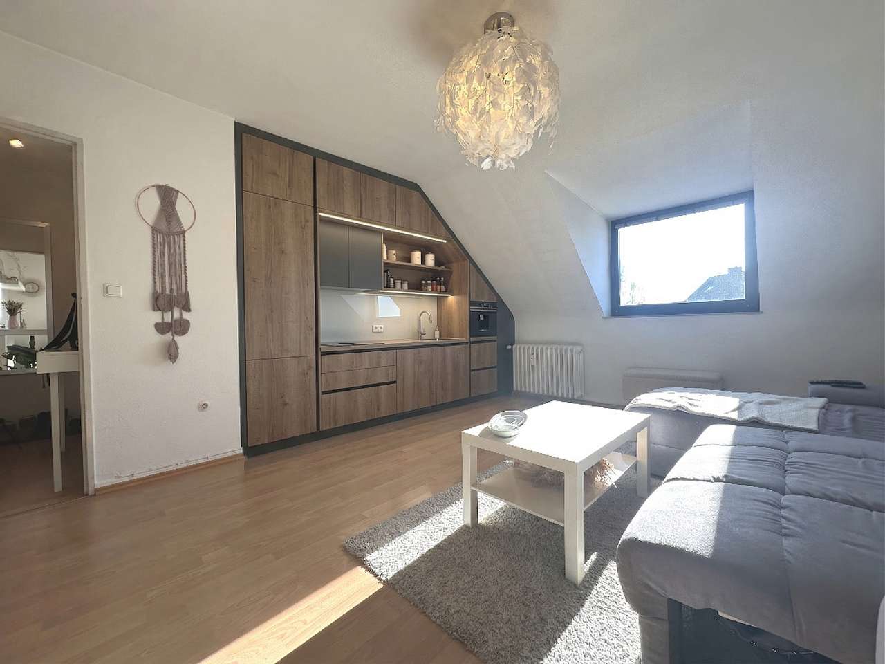 Top-Investment: Vermietete DG-Wohnung mit Garage & flexibler Raumnutzung!