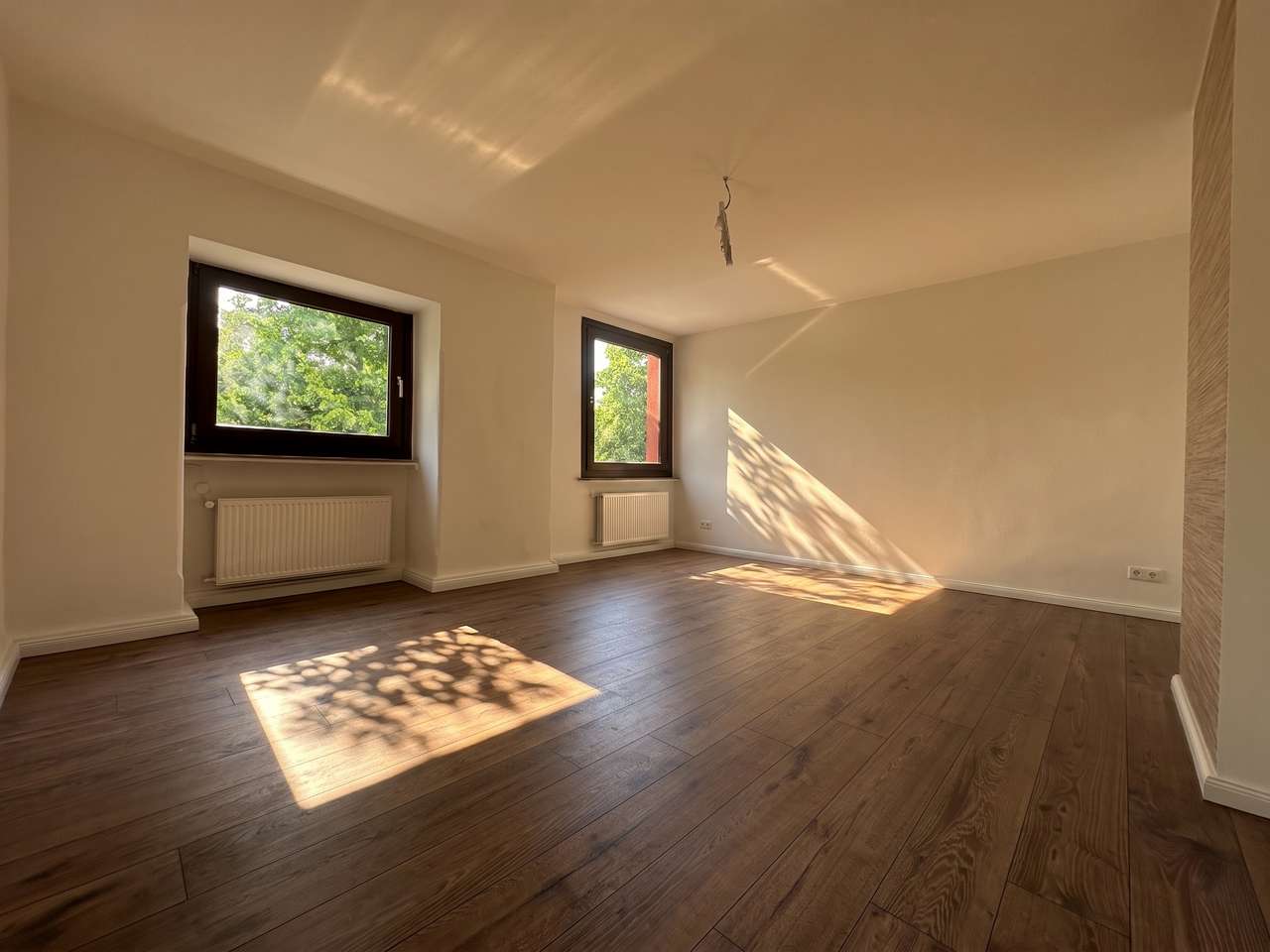 Historischer Charme trifft Moderne: Sanierte 3-Zimmer-Traumwohnung im Denkmal mit idyllischem Garten